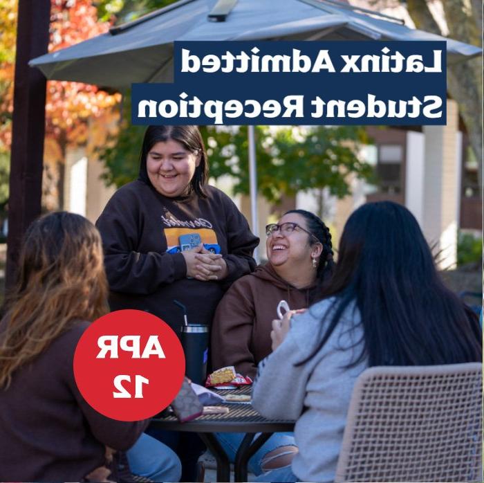 four students at a table