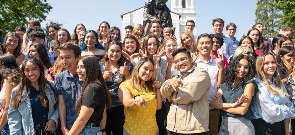 students excited outside chapel